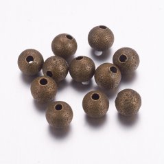 Mosazný korálek s texturou - bronzový, 6 mm
