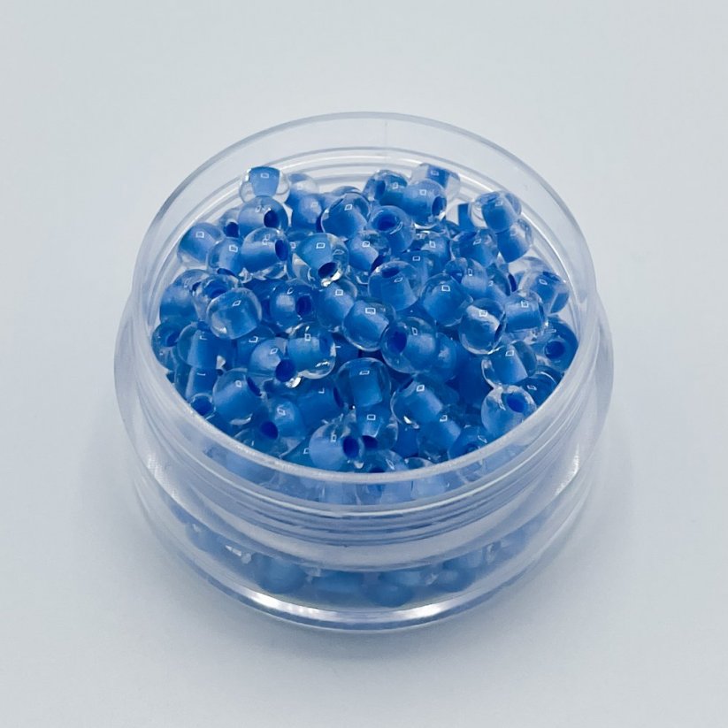 PRECIOSA rokajl 6/0 č. 38636, průhledně modrý - 50 g