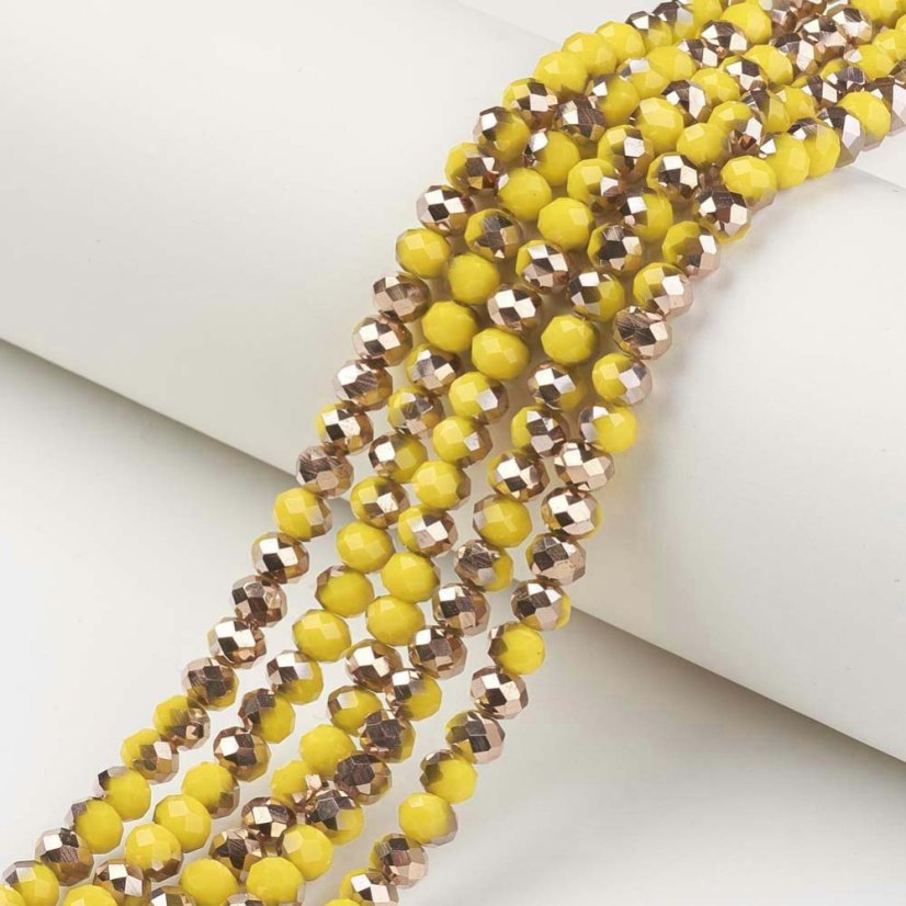 Fémezett üveg rondellák, csiszolt, sárga, 6x5 mm
