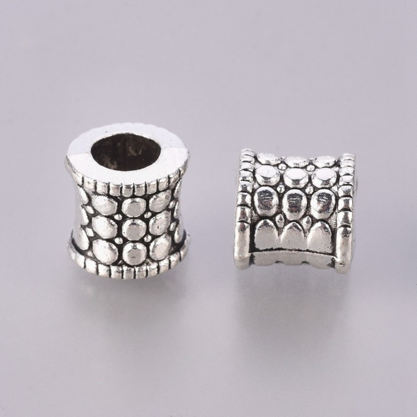 Kovový oddeľovač "prehnutý tunel" 8,5x8 mm