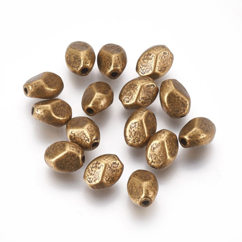 Fém elválasztó ovális, bronz, 7,5x6,5 mm