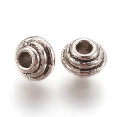 Kovový oddělovač spirála, 5x6,5x2mm