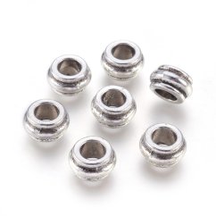 Kovová rondelka 12x7mm