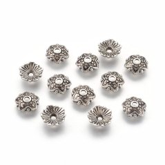 Kovový kaplík hvězdička stříbrný 8x8x2,5 mm, průvlek 1 mm