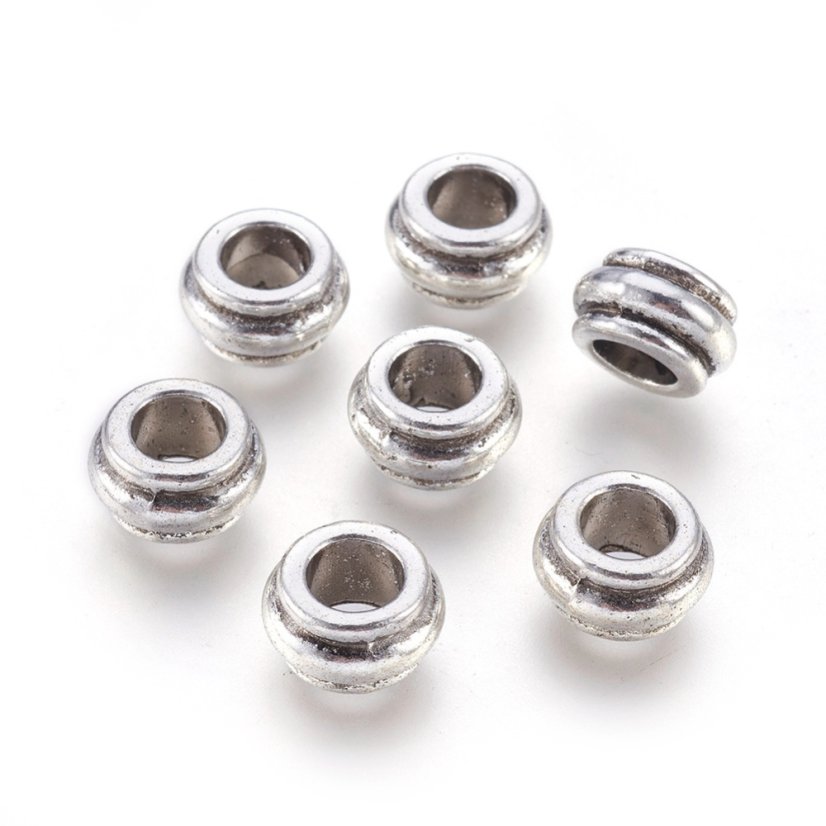 Kovová rondelka 12x7mm