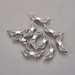 Kovový oddeľovač krídla so srdiečkom, strieborné, 20x7mm
