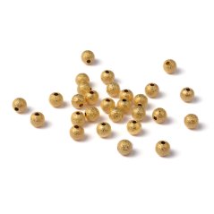 Texturált sárgaréz gyöngy - arany, 6 mm