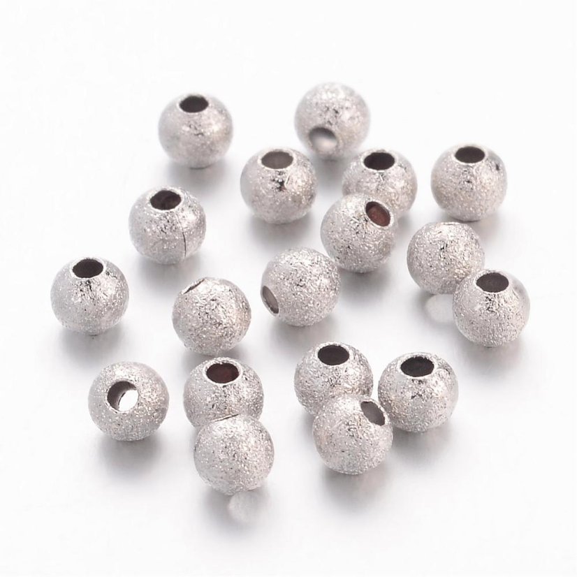 Texturált sárgaréz gyöngy - ezüst, 4 mm