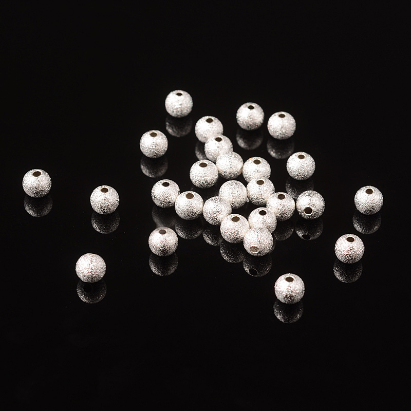 Texturált sárgaréz gyöngy - ezüst, 6 mm