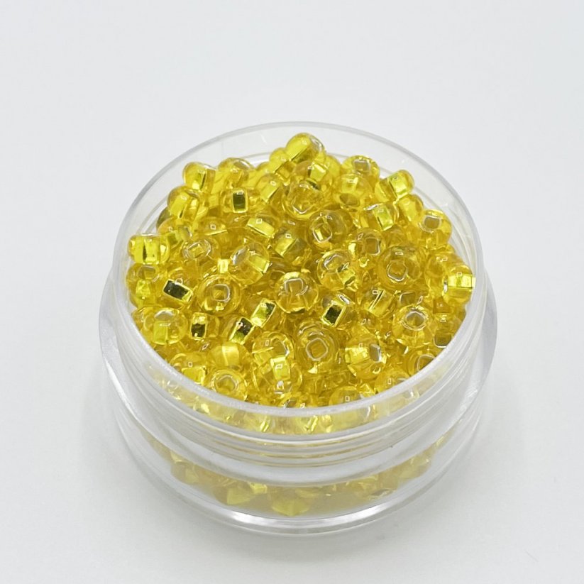 PRECIOSA Rocailles 6/0 Nr. 87010, transparent gelb - 50 g