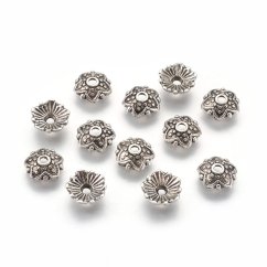 Kovový kaplík hvězdička stříbrný 8x8x2,5 mm, průvlek 1 mm