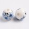 Keramikperlen mit Blume - weiß-blau, 12 mm