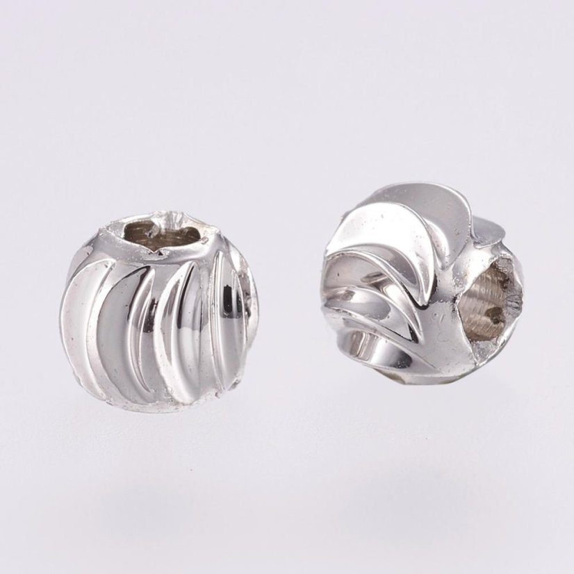 Sárgaréz elválasztó, texturált golyó, 4x3mm