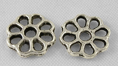 Kovový kaplík "kvetina"  9x1,5 mm