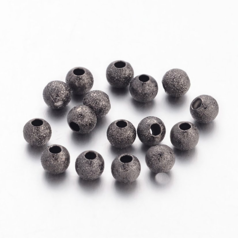 Texturált sárgaréz gyöngy - gunmetal, 4 mm